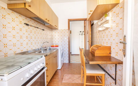 Vico Apartment Balcony, Gallipoli: Flooring, Wood, Floor, Interior Design, Kitchen, Major Appliance, Countertop, Room, Ceiling, Furniture