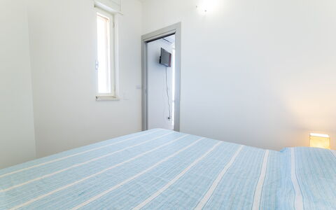 Sea View Apartment, Ac Gallipoli: Wall, Interior Design, Ceiling, Floor, Bedroom, Flooring, Lighting, Room, Bed, Apartment