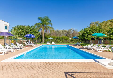 Beach Life Apartment In Boncore: Blue, Swimming Pool, Resort, Eco Hotel, Shade, Hotel, Landscaping, Hacienda, Thermae