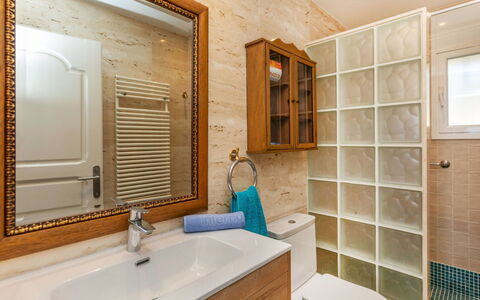 Luz del Mar: Wall, Interior Design, Flooring, Plumbing Fixture, Wood, Floor, Bathroom Cabinet, Bathroom, Room, Cabinetry