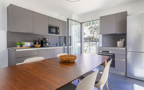 Prestige View: Furniture, Interior Design, Flooring, Countertop, Kitchen, Wood, Cabinetry, Floor, Ceiling, Home