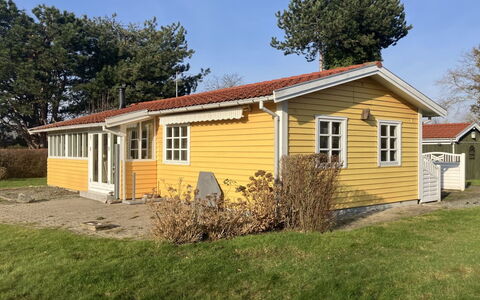 Andrine - 100M from the Sea: Roof, House, Home, Cottage, Siding, Estate, Driveway, Garden Buildings, Yard, Shed