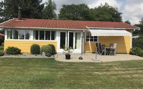 Andrine - 100M from the Sea: Roof, House, Home, Cottage, Siding, Estate, Driveway, Garden Buildings, Yard, Shed