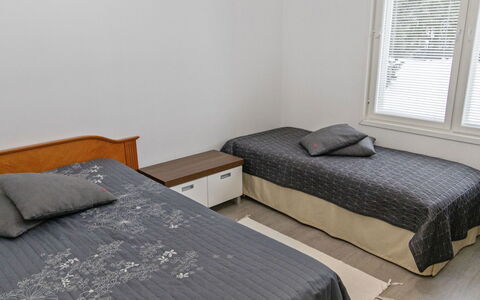 Villa Onnela: Bed, Furniture, Bedroom, Bedding, Bed Sheet, Interior Design, Floor, Wood, Flooring, Linens
