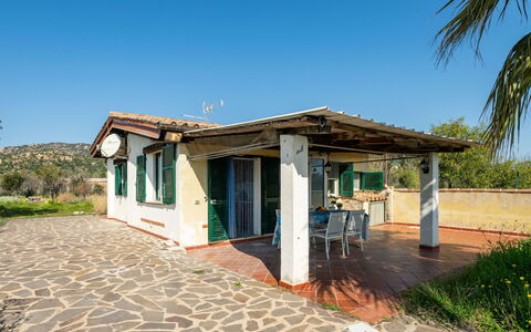 Costa Rei 666: Door, Cottage, Shade, Estate, Outdoor Structure, Porch, Bicycle, Villa, Hacienda