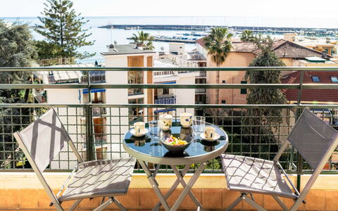 Sanremo Zampilli e Mare: Furniture, Chair, Table, Outdoor Furniture, Outdoor Table, Kitchen & Dining Room Table, Balcony, Shade, Coffee Table, Resort