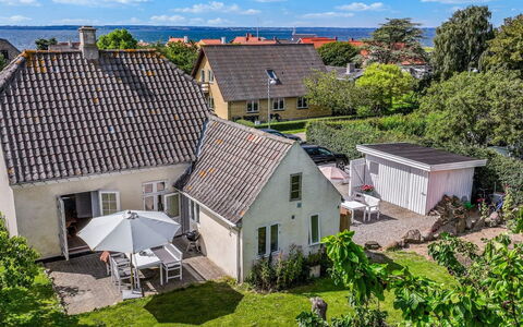 Karoliina - 125M from the Sea: Roof, House, Home, Cottage, Siding, Estate, Driveway, Garden Buildings, Yard, Shed
