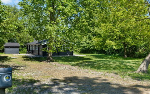 Doris - 150M from the Sea: Roof, House, Home, Cottage, Siding, Estate, Driveway, Garden Buildings, Yard, Shed