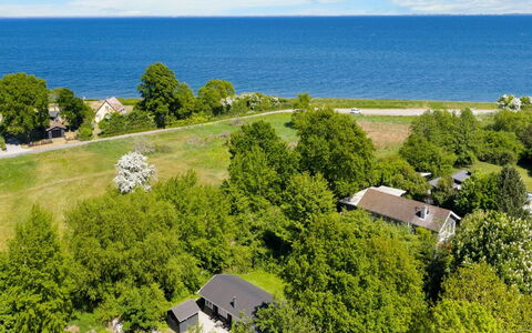 Doris - 150M from the Sea: Roof, House, Home, Cottage, Siding, Estate, Driveway, Garden Buildings, Yard, Shed