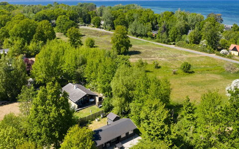 Doris - 150M from the Sea: Roof, House, Home, Cottage, Siding, Estate, Driveway, Garden Buildings, Yard, Shed