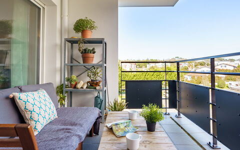 Résidence Liliak: Blue, Chair, Outdoor Furniture, Design, Shade, Outdoor Table, Eco Hotel, Patio, Houseplant, Daylighting