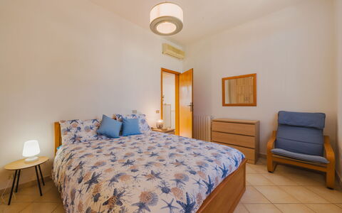 Appartamento Scirocco: Blue, Chair, Outdoor Furniture, Design, Shade, Outdoor Table, Eco Hotel, Patio, Houseplant, Daylighting