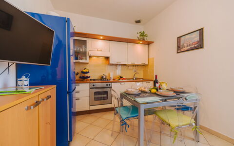 Appartamento Scirocco: Blue, Chair, Outdoor Furniture, Design, Shade, Outdoor Table, Eco Hotel, Patio, Houseplant, Daylighting