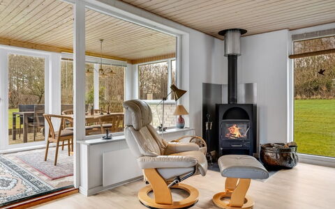 Marika - 400M to the Fjord: Furniture, Flooring, Interior Design, Wood, Wood Flooring, Floor, Chair, Lighting, Home, Living Room
