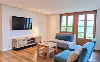 Chalet Adlerhorst Eg 220.2: Furniture, Interior Design, Flooring, Floor, Wood, Room, Couch, Wood Flooring, Table, Living Room