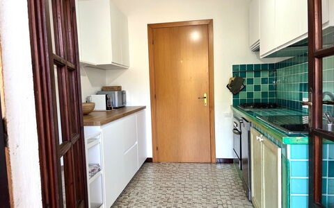 Itaca: Kitchen, Interior Design, Flooring, Wood, Countertop, Floor, Major Appliance, Kitchen Appliance, Cabinetry, Lighting