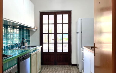 Itaca: Kitchen, Flooring, Interior Design, Floor, Countertop, Wood, Furniture, Kitchen Appliance, Sink, Cabinetry