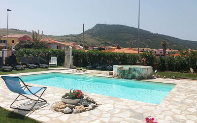 Residenza Agnese Sardegna: Swimming Pool, Resort, Outdoor Furniture, Leisure, Flagstone, Water Feature, Eco Hotel, Umbrella, Shade, Hacienda