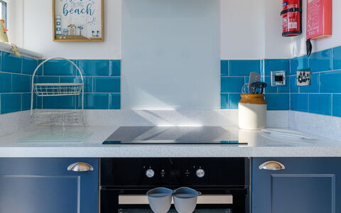 Lighthouse Watch: Kitchen, Kitchen Appliance, Major Appliance, Countertop, Kitchen Stove, Interior Design, Stove, Gas Stove, Flooring, Cabinetry