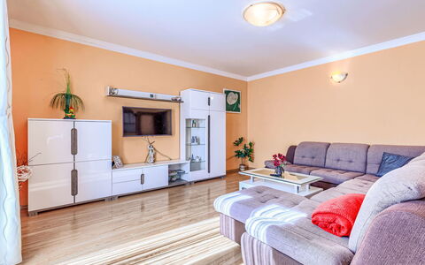 Soriso: Furniture, Interior Design, Flooring, Floor, Couch, Television, Wood, Ceiling, Room, Living Room
