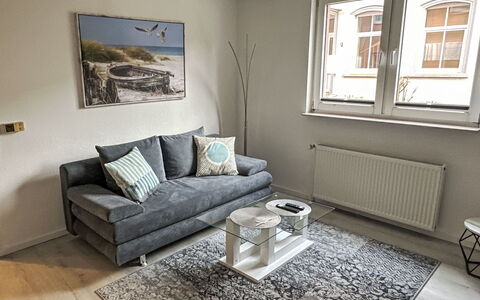 Boddenidyll: Furniture, Flooring, Couch, Interior Design, Floor, Wood, Living Room, Room, Apartment