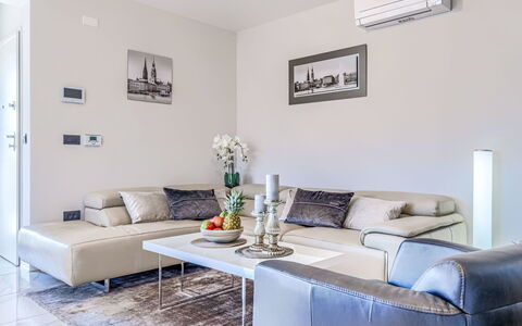 Marina: Furniture, Interior Design, Couch, Flooring, Floor, Living Room, Room, Home, Table, Ceiling