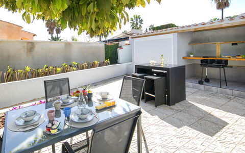 Isa: Furniture, Chair, Outdoor Furniture, Flooring, Table, Floor, Flowerpot, Houseplant, Outdoor Table, Garden