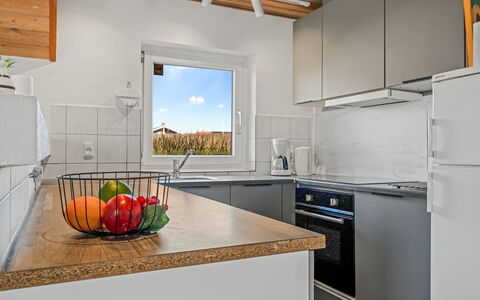Nikolce - 300M to the Fjord: Kitchen, Countertop, Kitchen Appliance, Interior Design, Flooring, Furniture, Wood, Major Appliance, Cabinetry, Ceiling