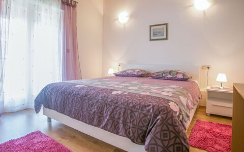 Villa Nevena: Bed, Interior Design, Furniture, Bedroom, Bed Sheet, Floor, Bedding, Ceiling, Flooring, Wood