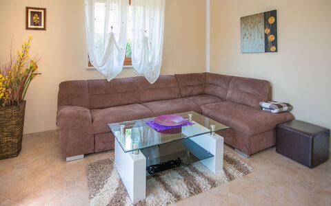 Villa Nevena: Furniture, Interior Design, Flooring, Couch, Floor, Wood, Living Room, Table, Room, Home