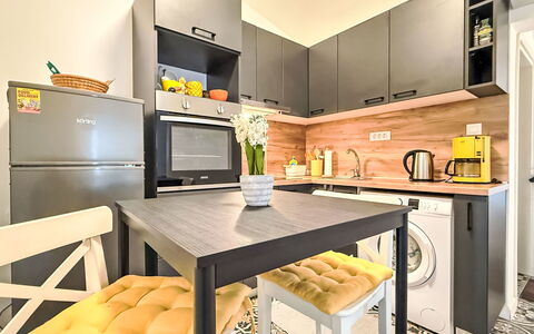 Martina: Furniture, Interior Design, Kitchen Appliance, Flooring, Major Appliance, Kitchen, Wood, Floor, Countertop, Room