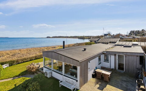 Solbritt - 30M from the Sea: Roof, House, Home, Cottage, Door, Siding, Deck, Porch, Plank, Hardwood