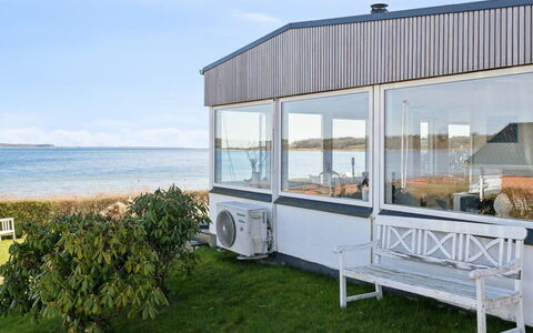 Solbritt - 30M from the Sea: Roof, House, Home, Cottage, Door, Siding, Deck, Porch, Plank, Hardwood