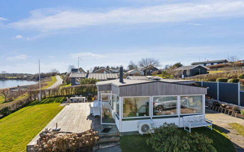 Solbritt - 30M from the Sea: Roof, House, Home, Cottage, Door, Siding, Deck, Porch, Plank, Hardwood