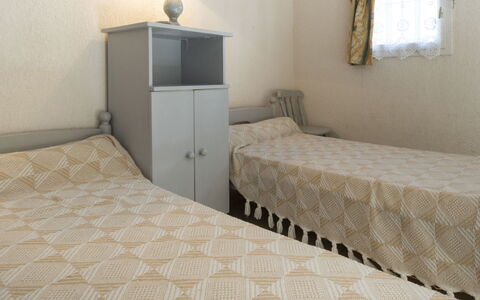 Les Ondines 2: Bed, Bedroom, Furniture, Wall, Bedding, Bed Sheet, Floor, Interior Design, Wood, Linens