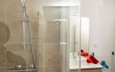 Racines: Flooring, Interior Design, Plumbing Fixture, Floor, Bathroom, Plumbing, Shower, Shower Head, Tile, Home
