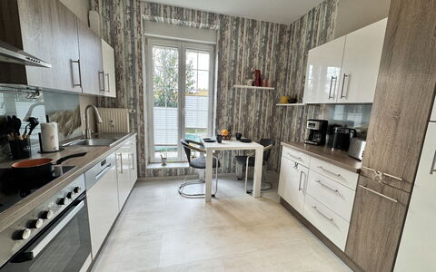 Feli: Kitchen, Countertop, Kitchen Appliance, Furniture, Flooring, Wood, Major Appliance, Cabinetry, Interior Design, Floor