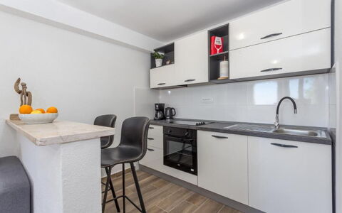 Appartamento Nomads, Ac, Wifi Hvar: Furniture, Interior Design, Countertop, Flooring, Wood, Cabinetry, Floor, Room, Kitchen, Home