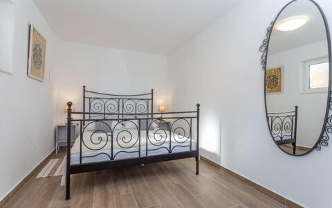 Appartamento Nomads, Ac, Wifi Hvar: Flooring, Interior Design, Floor, Bed, Furniture, Wood, Bedroom, Room, Ceiling, Lighting