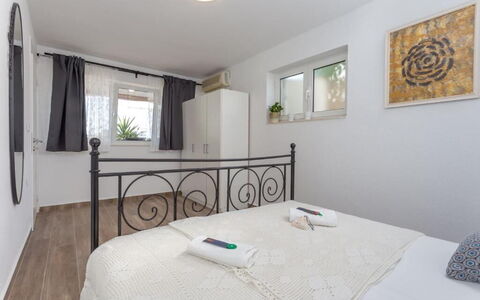Appartamento Nomads, Ac, Wifi Hvar: Bed, Furniture, Bedroom, Interior Design, Bedding, Bed Sheet, Floor, Room, Wood, Flooring