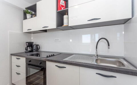 Appartamento Nomads, Ac, Wifi Hvar: Kitchen, Countertop, Major Appliance, Cabinetry, Kitchen Appliance, Interior Design, Flooring, Kitchen Stove, Floor, Stove