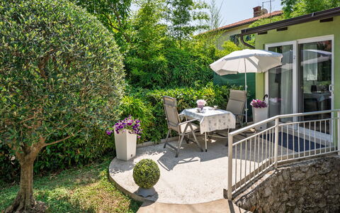 Villa Nika Studio: Shrub, Garden, Furniture, Outdoor Furniture, Home, Chair, Outdoor Table, Shade, Yard