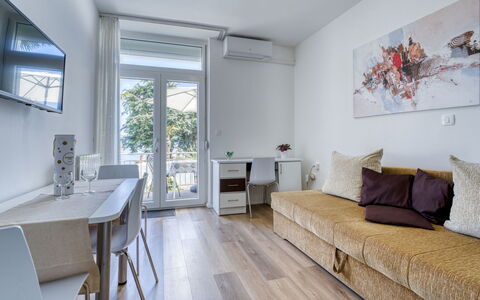 Villa Nika: Interior Design, Furniture, Flooring, Floor, Wood, Wood Flooring, Room, Living Room, Ceiling, Apartment