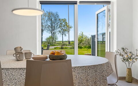 Ilsebeth - 400M from the Sea: Furniture, Interior Design, Table, Kitchen & Dining Room Table, Flooring, Dining Room, Chair, Floor, Lighting, Tableware