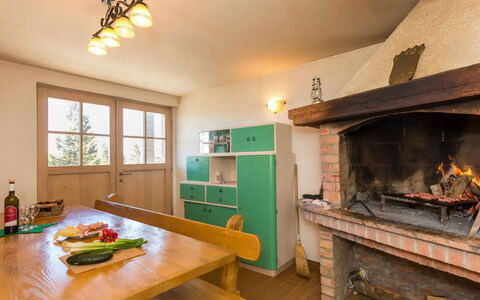 Lea: Wood, Ceiling, Interior Design, Furniture, Room, Wood Stain, Light Fixture, Chair, Cabinetry, Kitchen