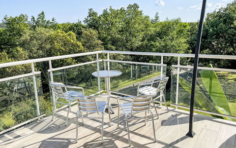 Castellas: Handrail, Balcony, Deck, Outdoor Furniture, Chair, Metal, Fence, Porch, Shade, Hardwood
