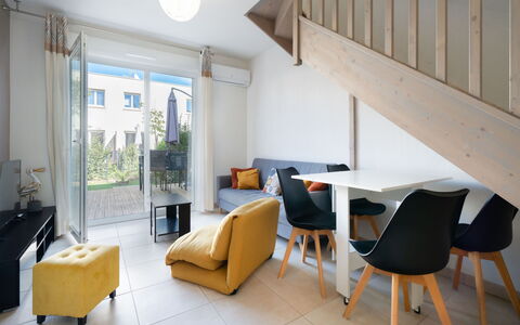La Dune: Interior Design, Furniture, Flooring, Floor, Wood, Room, Ceiling, Couch, Living Room, Lighting