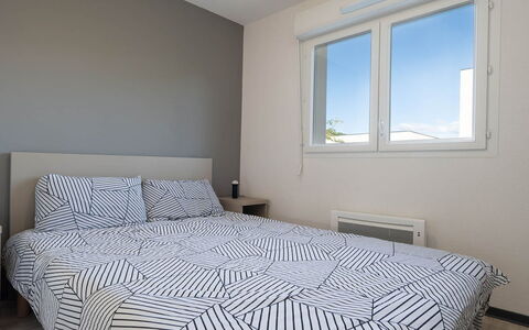 La Dune: Bed, Bedding, Bedroom, Interior Design, Bed Sheet, Wall, Furniture, Floor, Flooring, Wood