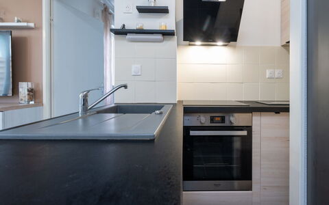 La Dune: Furniture, Wood, Interior Design, Flooring, Kitchen, Cabinetry, Floor, Room, Major Appliance, Cupboard