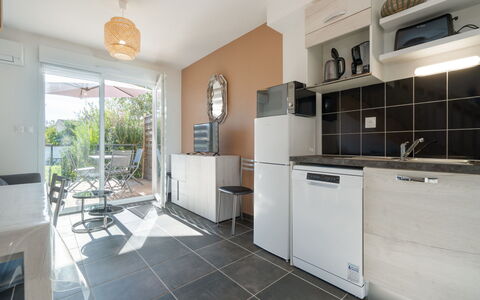 La Dune: Furniture, Wood, Interior Design, Flooring, Kitchen, Cabinetry, Floor, Room, Major Appliance, Cupboard
